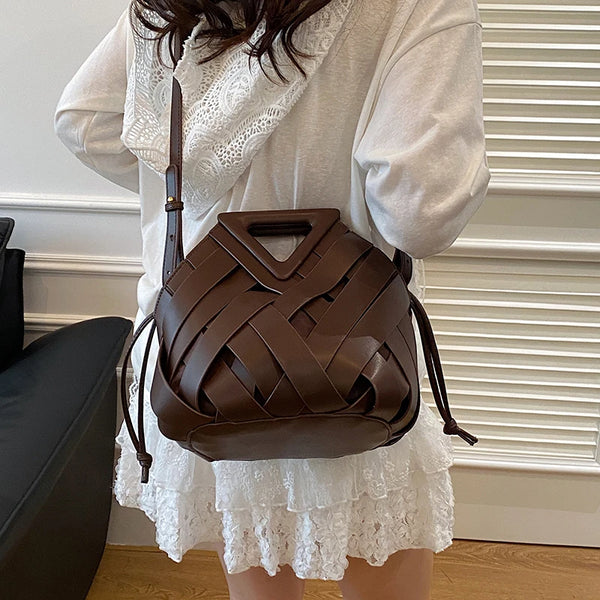 Nova bolsa de ombro feminina versátil, design de nicho 2025