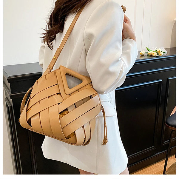 Nova bolsa de ombro feminina versátil, design de nicho 2025