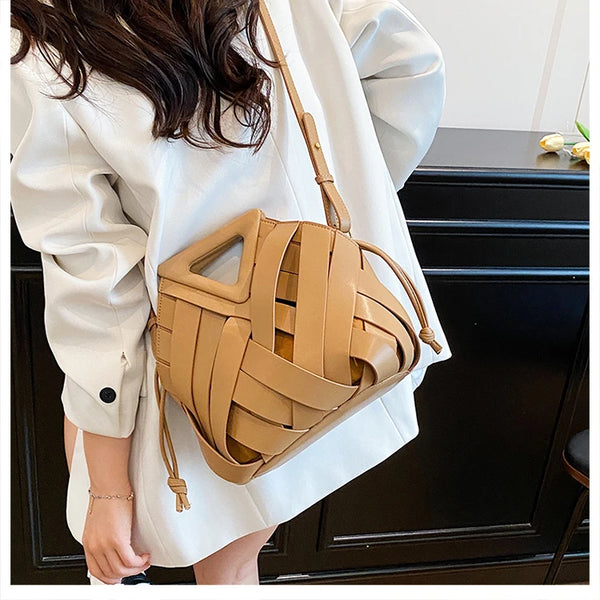 Nova bolsa de ombro feminina versátil, design de nicho 2025