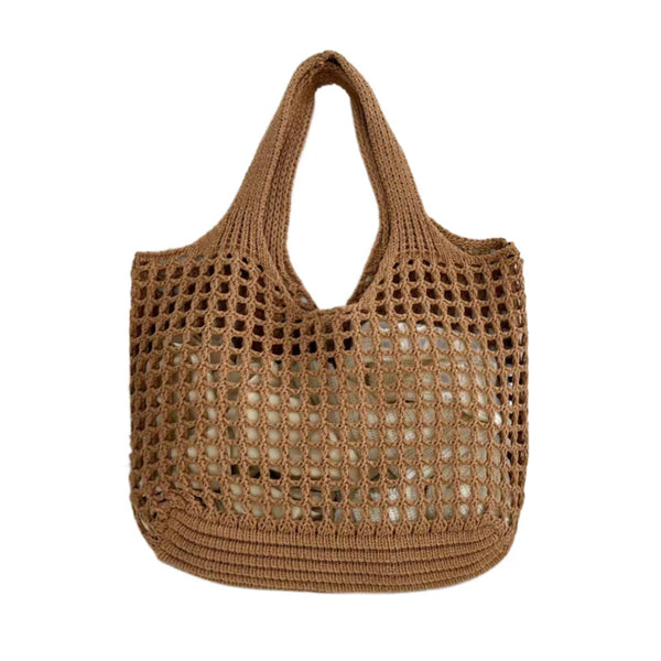 Bolsa feminina de crochê, leve e estilosa — perfeita para dias de sol, passeios e momentos na praia com muito charme e conforto.