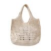 Bolsa feminina de crochê, leve e estilosa — perfeita para dias de sol, passeios e momentos na praia com muito charme e conforto.