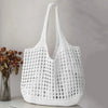 Bolsa feminina de crochê, leve e estilosa — perfeita para dias de sol, passeios e momentos na praia com muito charme e conforto.