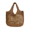 Bolsa feminina de crochê, leve e estilosa — perfeita para dias de sol, passeios e momentos na praia com muito charme e conforto.