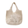 Bolsa feminina de crochê, leve e estilosa — perfeita para dias de sol, passeios e momentos na praia com muito charme e conforto.